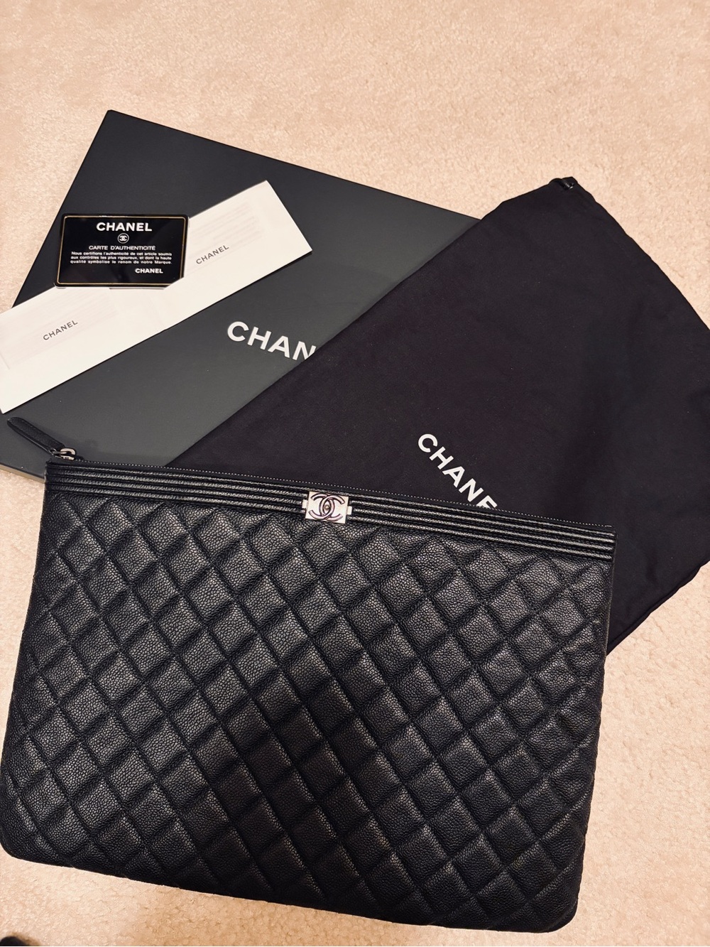 CHANEL Black Quilted Caviar Leather Pouch with Silver CC Slide